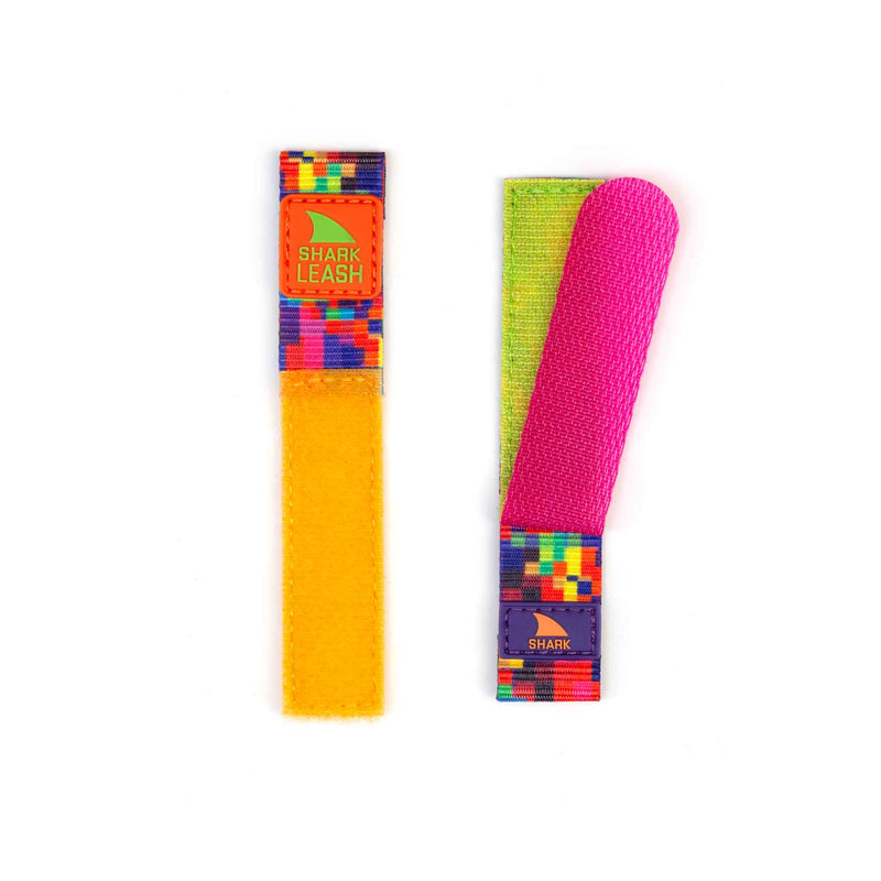 Two vibrant Freestyle STRAP KIT - LEASH - ALOHA PIXELATED straps with Velcro closure, displayed against a white background.