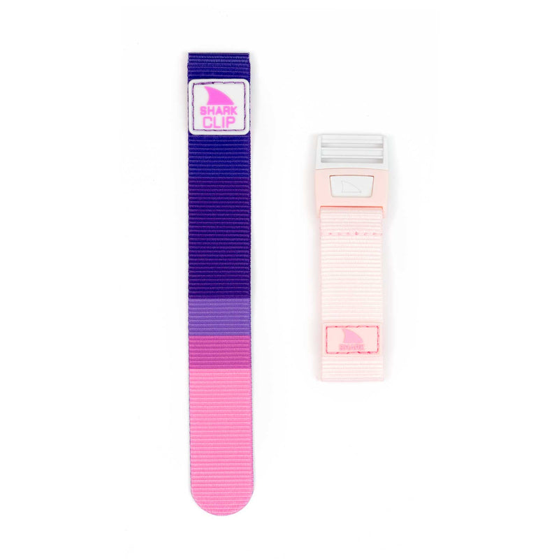 Two colorful Freestyle watch straps: one purple-pink and one light pink, both featuring clip closures.