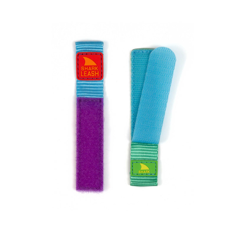 The Freestyle STRAP KIT - LEASH - CARNIVAL features purple/red and blue/green straps with secure closures on white.