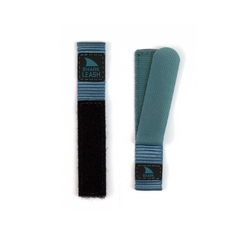 Two Freestyle STRAP KIT - LEASH - TEAL straps, one fastened and one unfastened, displayed on a white background.