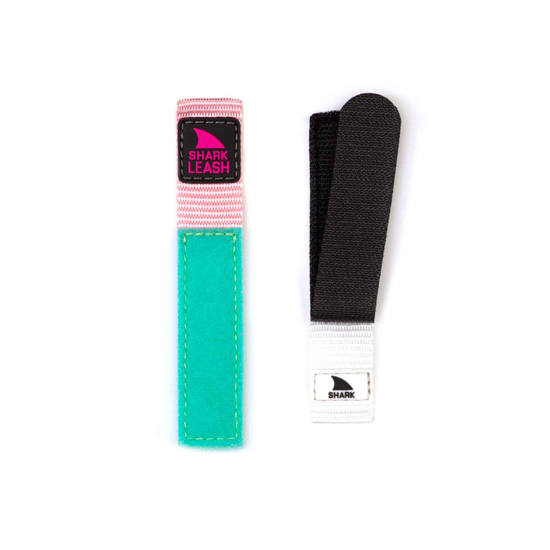 Two Freestyle STRAP KIT - LEASH - TAFFY wrist straps in teal and black, each featuring leash closure accents.