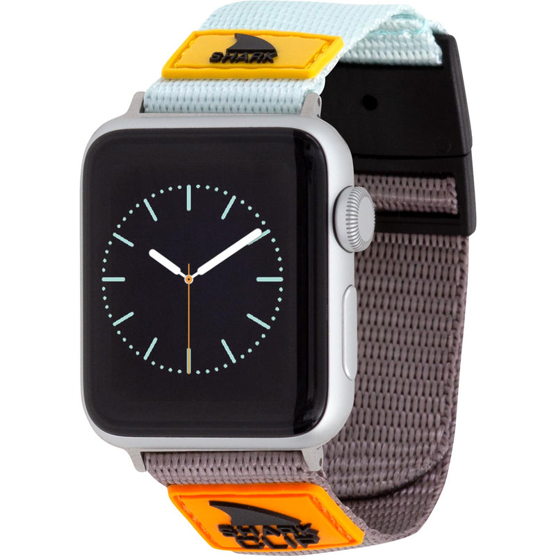 A Freestyle APPLE WATCH™ CLIP STRAP in turquoise, black, and mustard with yellow SHARK logo patches.