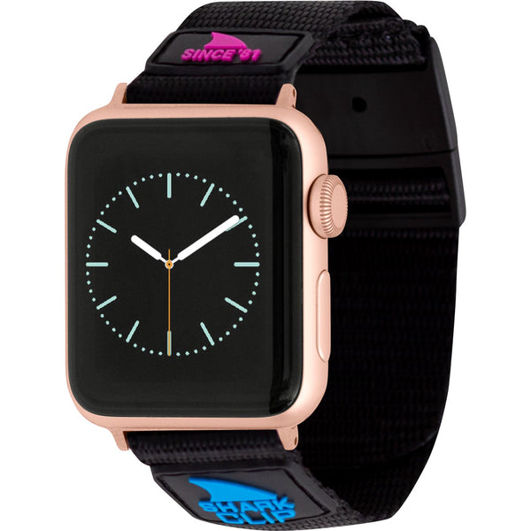 The Freestyle APPLE WATCH™ CLIP STRAP PRIMARY BLACK showcases a gold case, black screen, and a strap with blue and pink accents.