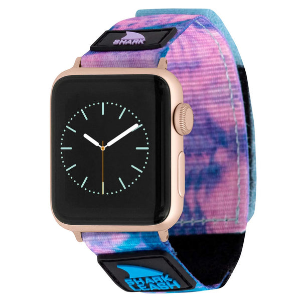 Freestyle APPLE WATCH™ featuring a gold case, tie-dye strap, leash closure, and analog display.