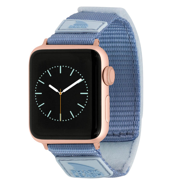 APPLE WATCH™ LEASH STRAP SKY with a rose gold case, blue fabric strap, and analog clock face from Freestyle.