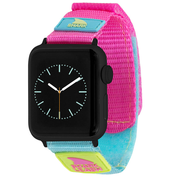 Freestyle APPLE WATCH™ LEASH STRAP in POPSICLE design with a black watch face and a pink-blue fabric strap showcasing a vibrant shark pattern.