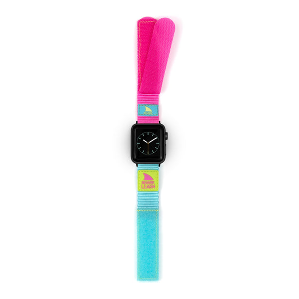 APPLE WATCH™ with a LEASH STRAP POPSICLE by Freestyle, featuring a colorful pink and light blue design with small graphics.