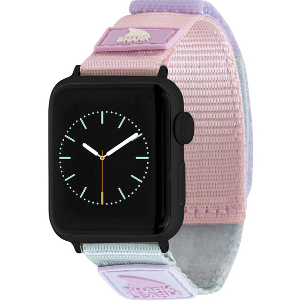 APPLE WATCH™ LEASH STRAP WILDWOOD in pastel pink and lavender by Freestyle, featuring an analog clock displayed on the smartwatch screen.