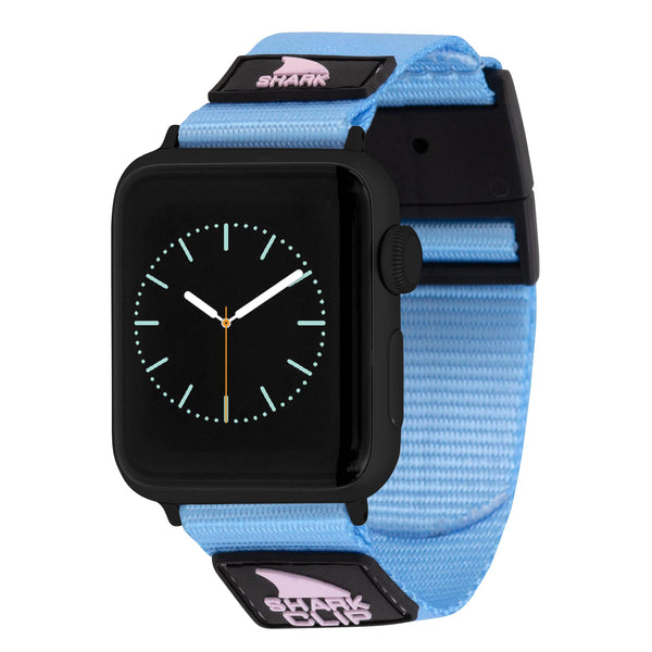 A black smartwatch with an APPLE WATCH™ CLIP STRAP in acai berry by Freestyle, showcasing black details and a pink shark logo.