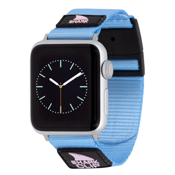 Freestyles APPLE WATCH™ CLIP STRAP ACAI BERRY is a blue strap featuring pink shark logos.