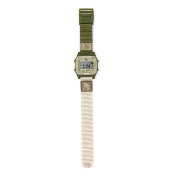 Freestyles SHARK CLASSIC CLIP ENSENADA digital surf watch with a green face, beige strap, and LCD time display from Freestyle Watches.