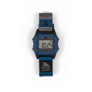 Freestyle SHARK CLASSIC CLIP MISSION BEACH digital watch with blue/black face and surf-inspired “Shark Clip” strap.