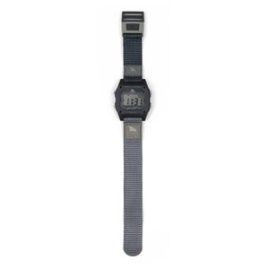 Freestyle SHARK CLASSIC CLIP GRANITE PEAK digital surf watch featuring a gray band, rectangular face, and clasp on white.