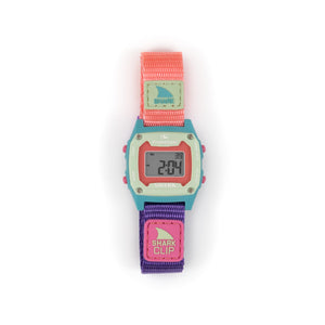 Freestyles SHARK MINI CLIP SEASCAPE watch features coastal vibes with a pink, purple, and teal band; display shows digital numbers.