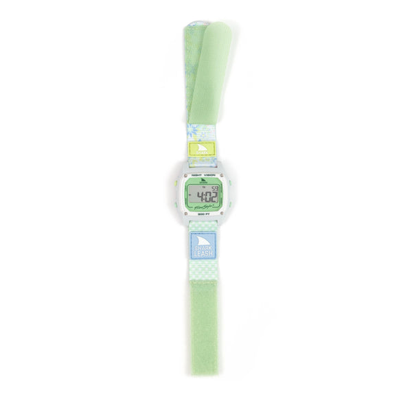Freestyle SHARK CLASSIC LEASH BOHO LIME watch with a pastel green strap in a surfboard leash style. Retro and water-resistant, perfect for beach days.