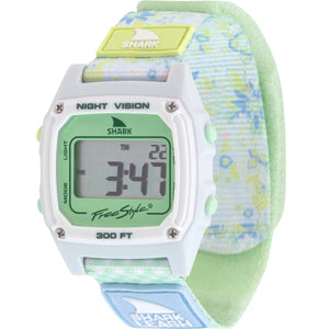 The Freestyle SHARK CLASSIC LEASH BOHO LIME watch features a pastel floral band and a water-resistant build.