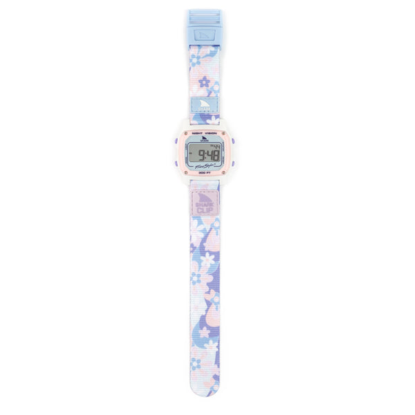 The SHARK CLASSIC CLIP watch by Freestyle displays the time as 9:48 on a floral strap, offering a stylish and chic look.