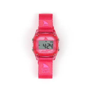 The Freestyle Shark Classic Clip Cherry has water resistance, a pink strap, and features digits on its digital display.