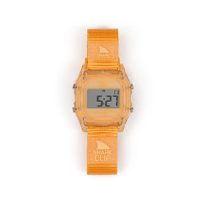The Freestyle SHARK CLASSIC CLIP TANGERINE showcases a clear case and is water resistant up to 300 feet.