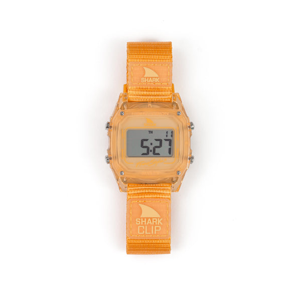 Freestyles SHARK CLASSIC CLIP TANGERINE watch from the Jelly Bean Collection, featuring an orange band, displays the time 5:27 PM.