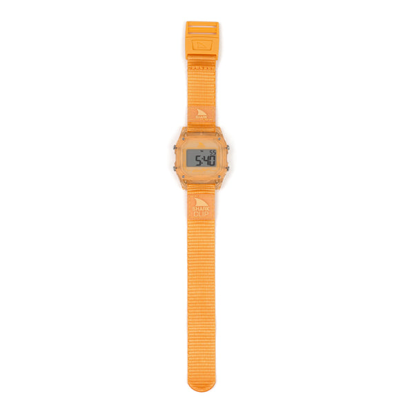 Freestyle SHARK CLASSIC CLIP TANGERINE: A bright orange square digital watch featuring a textured strap, water resistance, and a 5:40 time display.