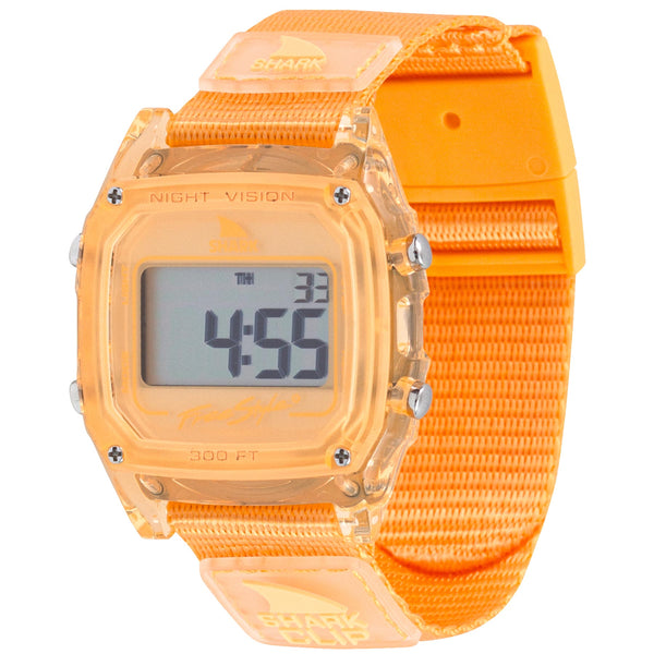 The Freestyle Shark Classic Clip Tangerine has a square face and is water-resistant, featured in the Jelly Bean Collection.