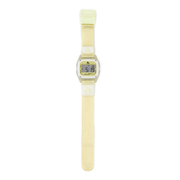 Freestyle SHARK CLASSIC CLIP SUNSHINE, a yellow digital surf watch with a Velcro strap, displaying 5:19; ideal for beach enthusiasts.