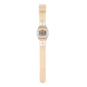 The Freestyle SHARK CLASSIC CLIP PEACH is a digital surf watch featuring a rectangular face, fabric strap, and water-resistant design.