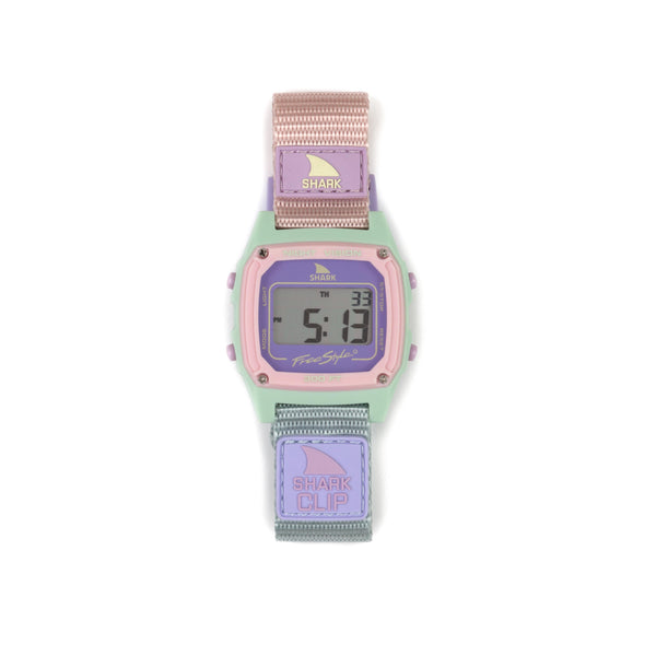 The SHARK CLASSIC CLIP WILDWOOD digital watch from Freestyle features a pastel green face and a vibrant multicolored band.