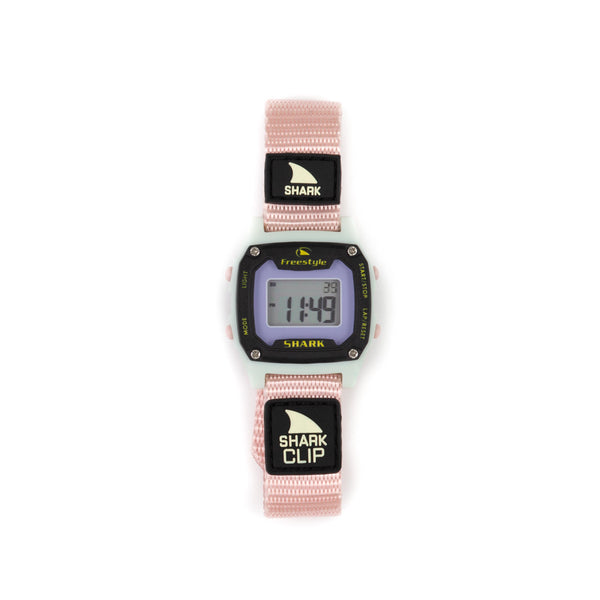 The Freestyle SHARK MINI CLIP MOCHI is a pink wristwatch featuring a square digital display and a water-resistant build.