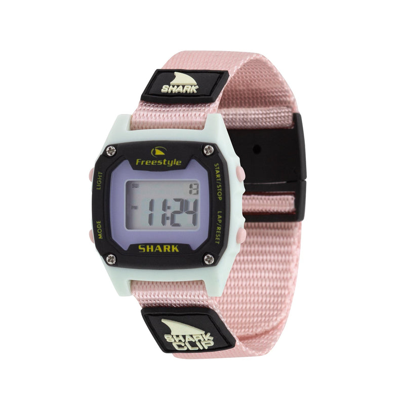 A Freestyle SHARK MINI CLIP MOCHI digital watch with a pink band and light blue case, with numbers visible on the display.