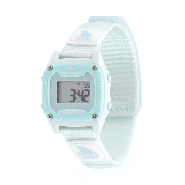 Light blue SHARK MINI LEASH ARCTIC RUSH watch with a durable strap displaying 3:42, featuring the Freestyle brand logo.