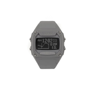 The Freestyle SHARK XL TIDE 600 GRAY wristwatch displays numbers and tide details on its water-resistant screen.