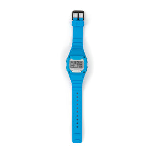 The Freestyle SHARK CLASSIC TIDE 600 BLUE (POS) displays information and tide details on a digital screen with a blue strap.