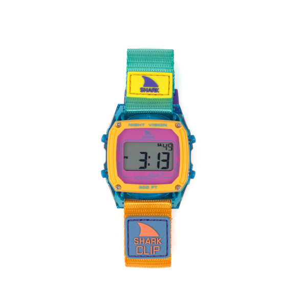 Colorful digital watch with shark design on a white background