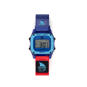 Digital watch with blue and red strap on a white background