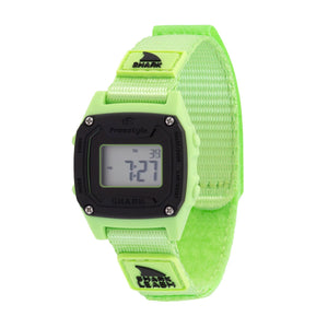 Digital watch with a bright green strap and black case on a white background