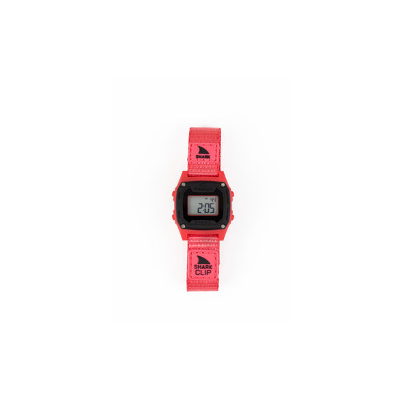 Red digital watch with a shark logo on a white background