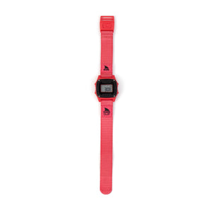 Digital watch with a red strap on a white background