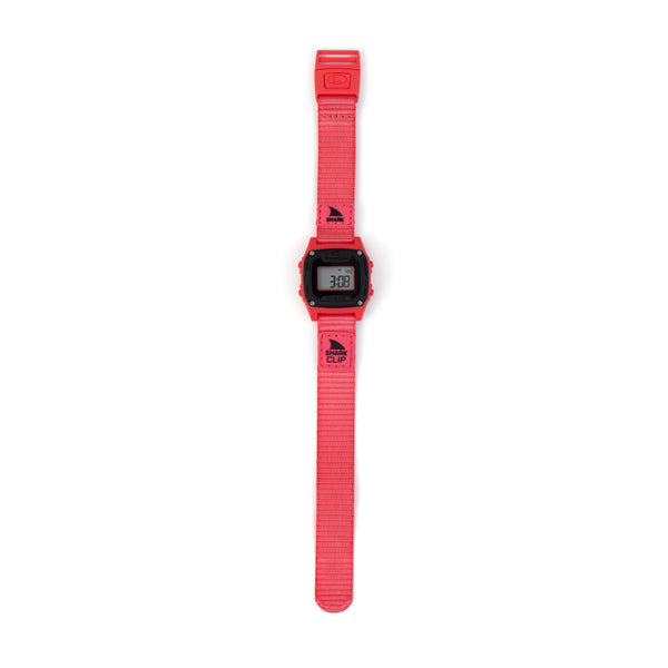 Digital watch with a red strap on a white background