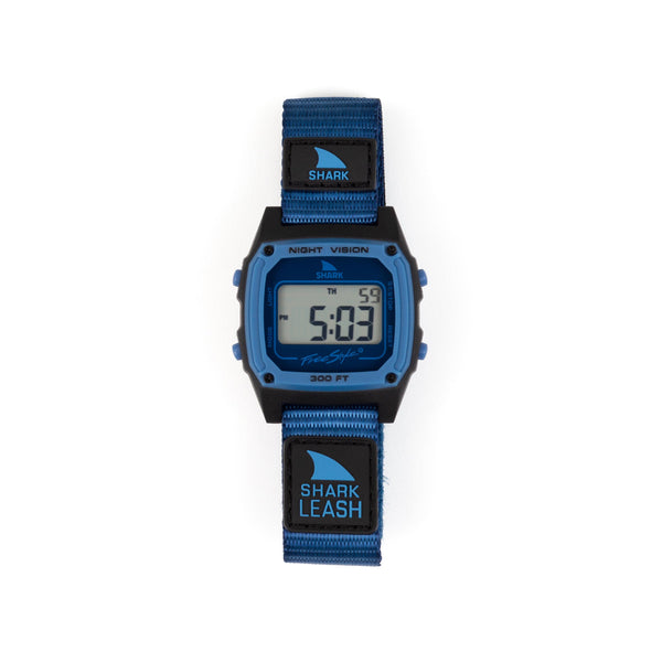 Digital watch with blue strap and shark fin logo on a white background