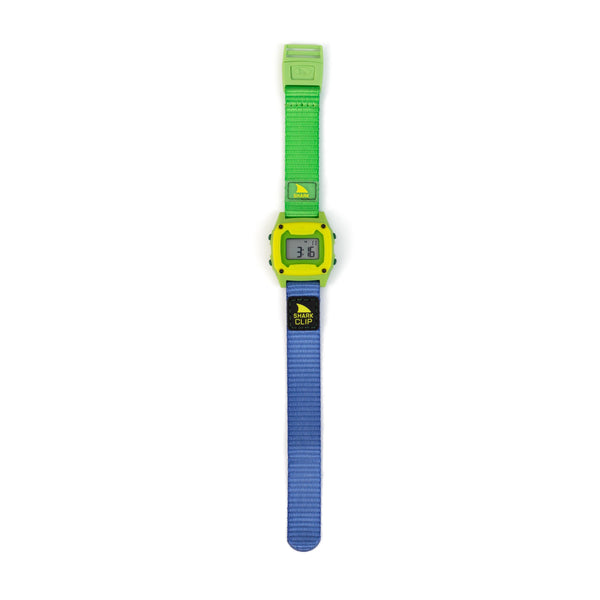 Digital watch with green strap on a white background