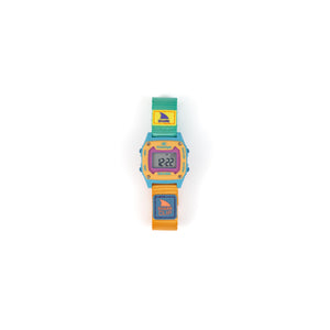 Colorful digital watch with a shark-themed strap on a white background
