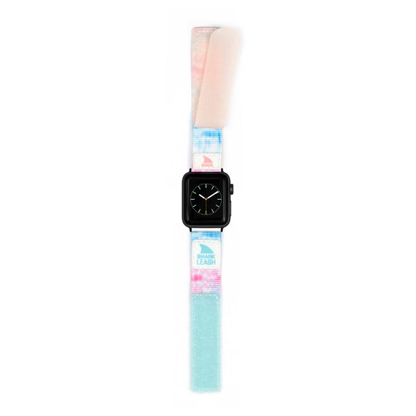 Freestyle APPLE WATCH™ featuring a black face and a distinctive LEASH STRAP in tie-dye pastel colors.