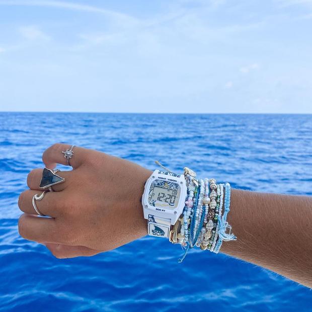 Shark Classic and bracelet stacks over open ocean