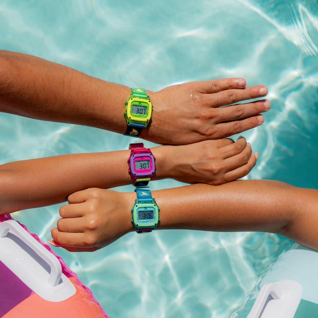 Three Shark watches poolside