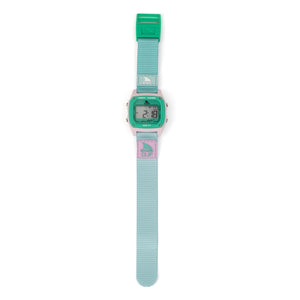 The Freestyle SHARK CLASSIC CLIP PURE AQUA features a light blue strap, green case, and water resistance.