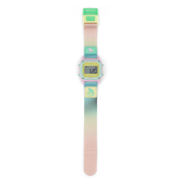 Scenic Sky watch with a gradient strap fading from light blue to pastel peach, Shark Clip closure, and essential digital watch functions.
