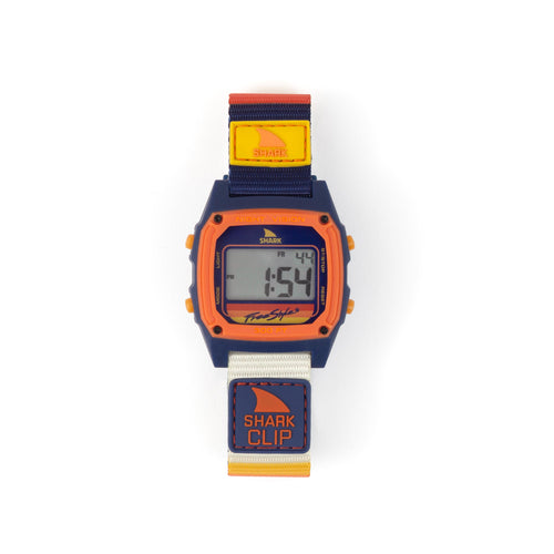 Freestyle SHARK CLASSIC CLIP SURF CITY: digital watch with orange/navy case, multicolored strap, SoCal surf-inspired design.