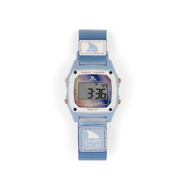 Front view of the Freestyle Shark Clip watch with a blue-to-mauve gradient strap, night vision display, and durable water-resistant design.